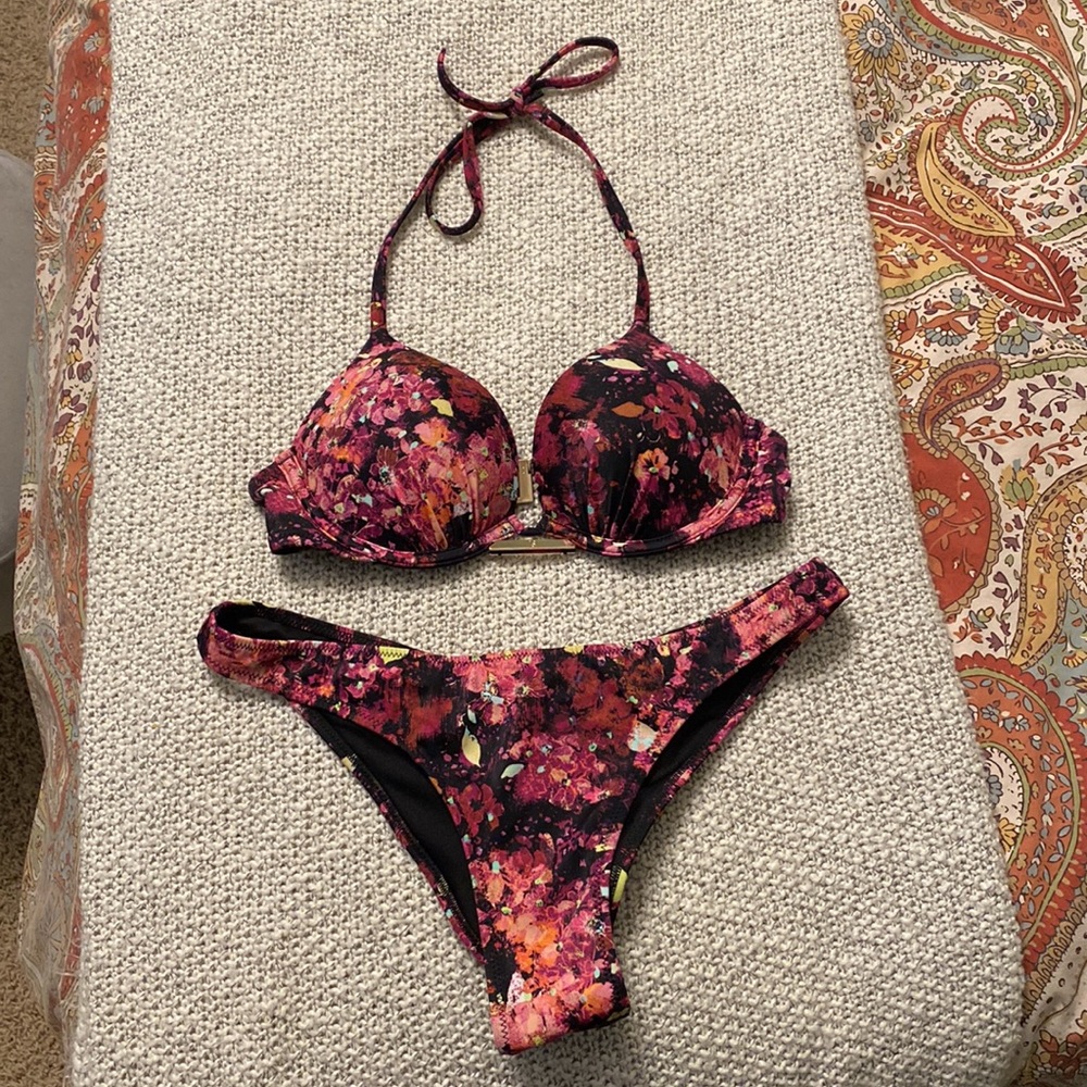 Top 32A Bottoms medium.  Worn once. Like new.  Cheeky.  Gold like details